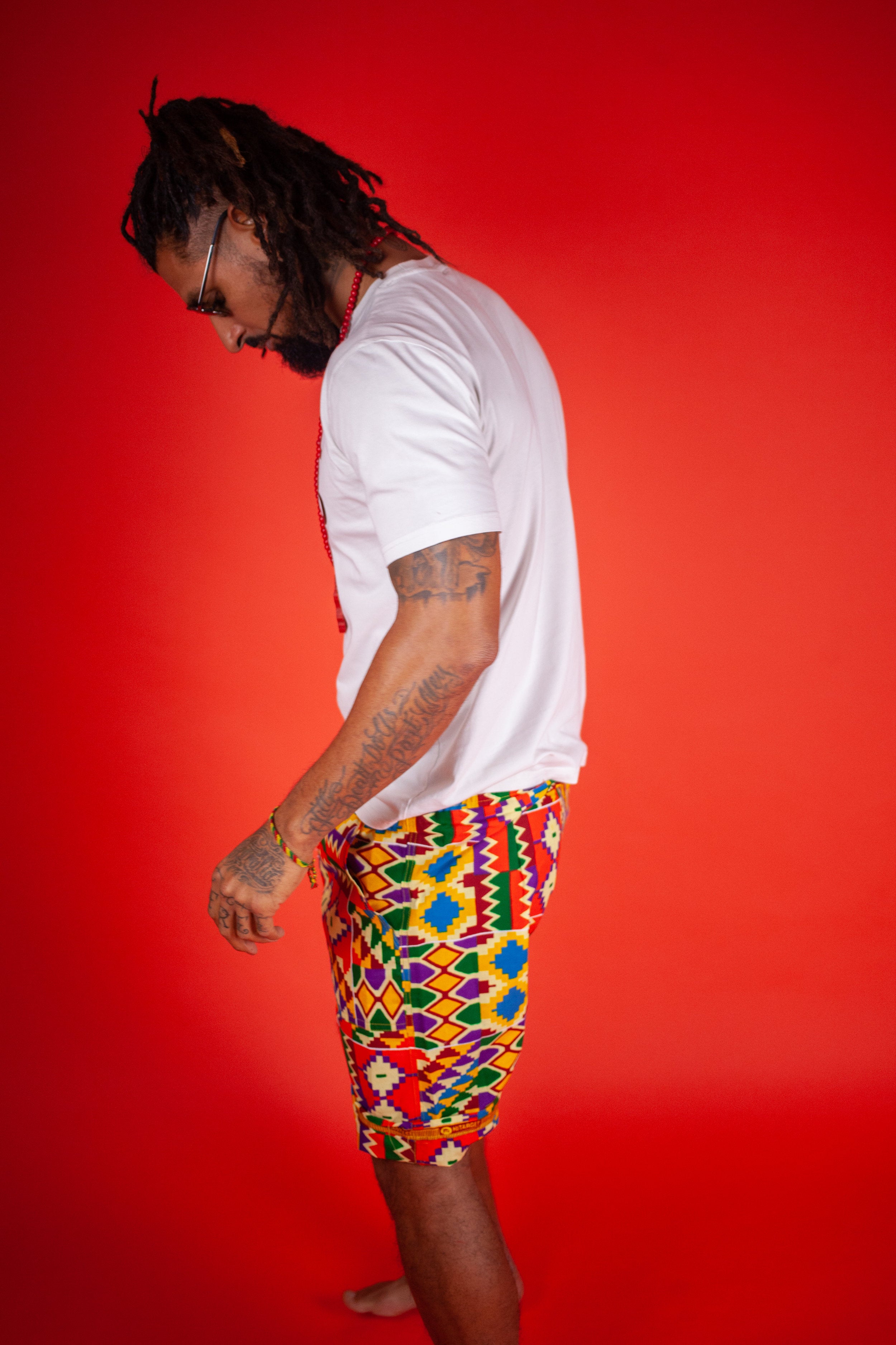 African Shorts in Electric Orange Kente - Continent Clothing
