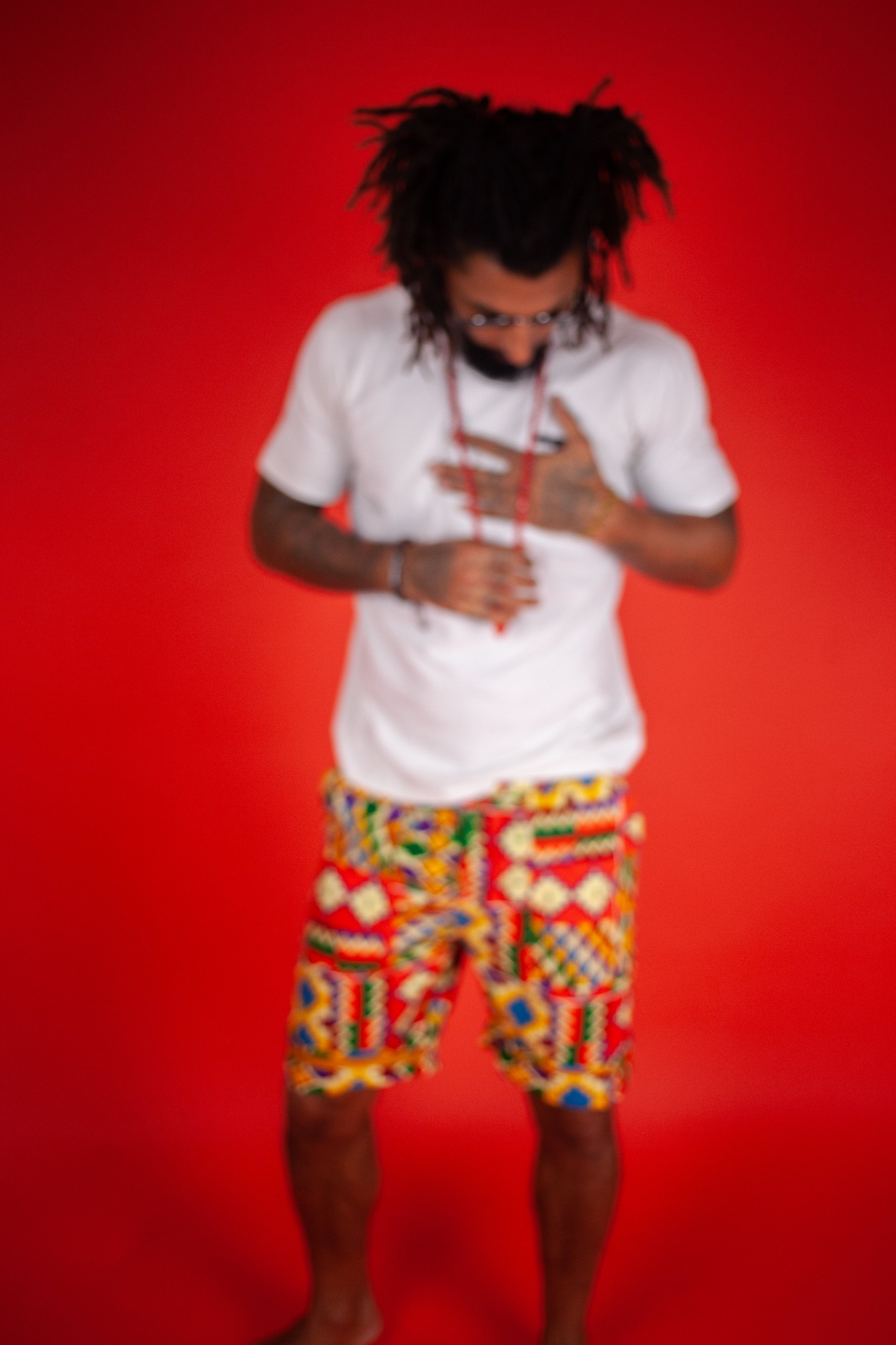 African Shorts in Electric Orange Kente - Continent Clothing