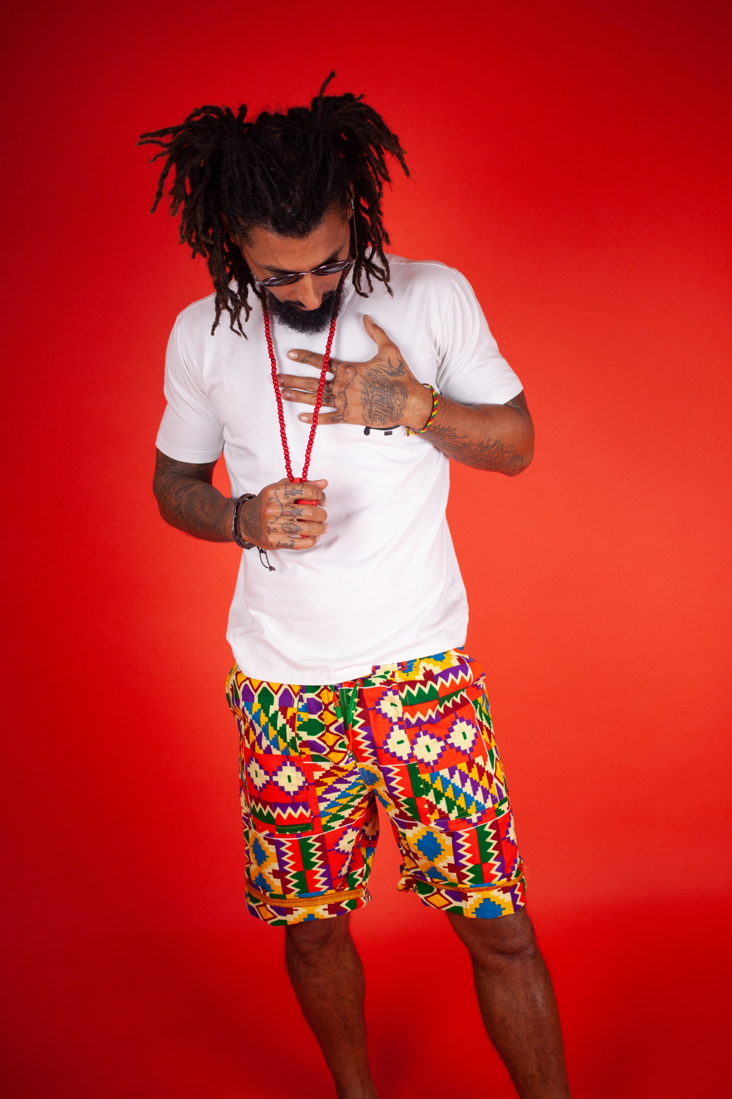 African Shorts in Electric Orange Kente - Continent Clothing 