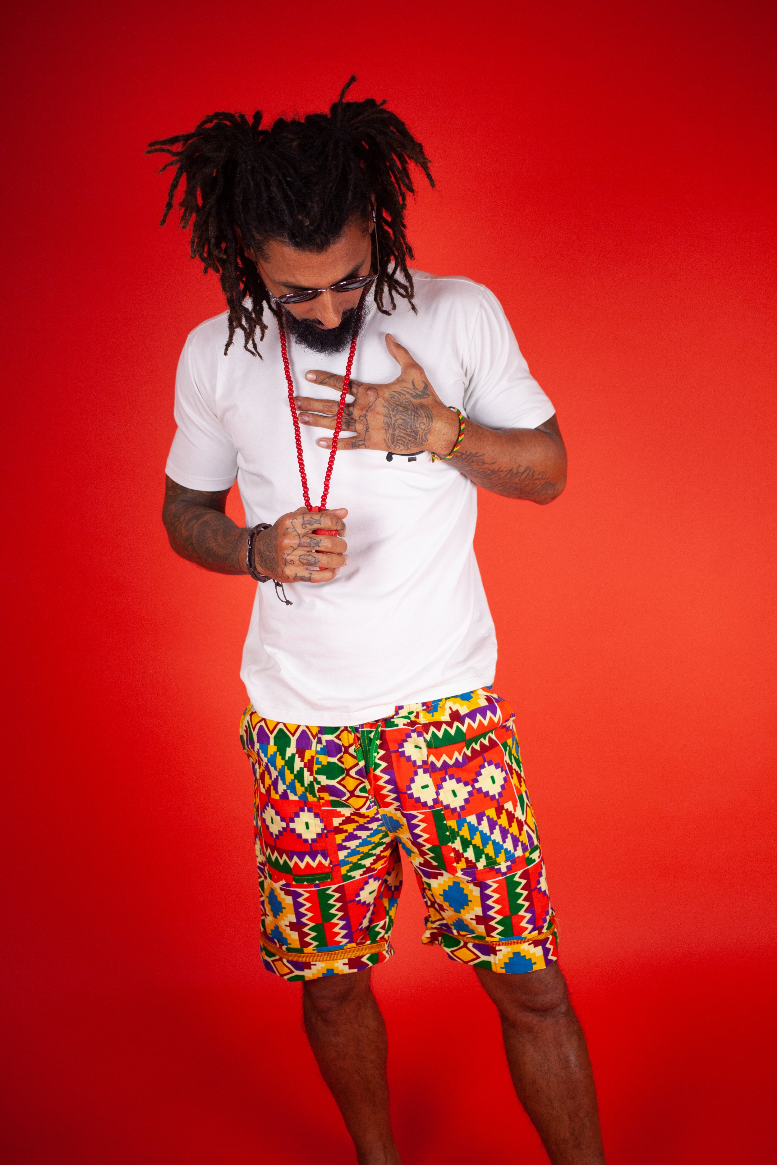 African Shorts in Electric Orange Kente - Continent Clothing