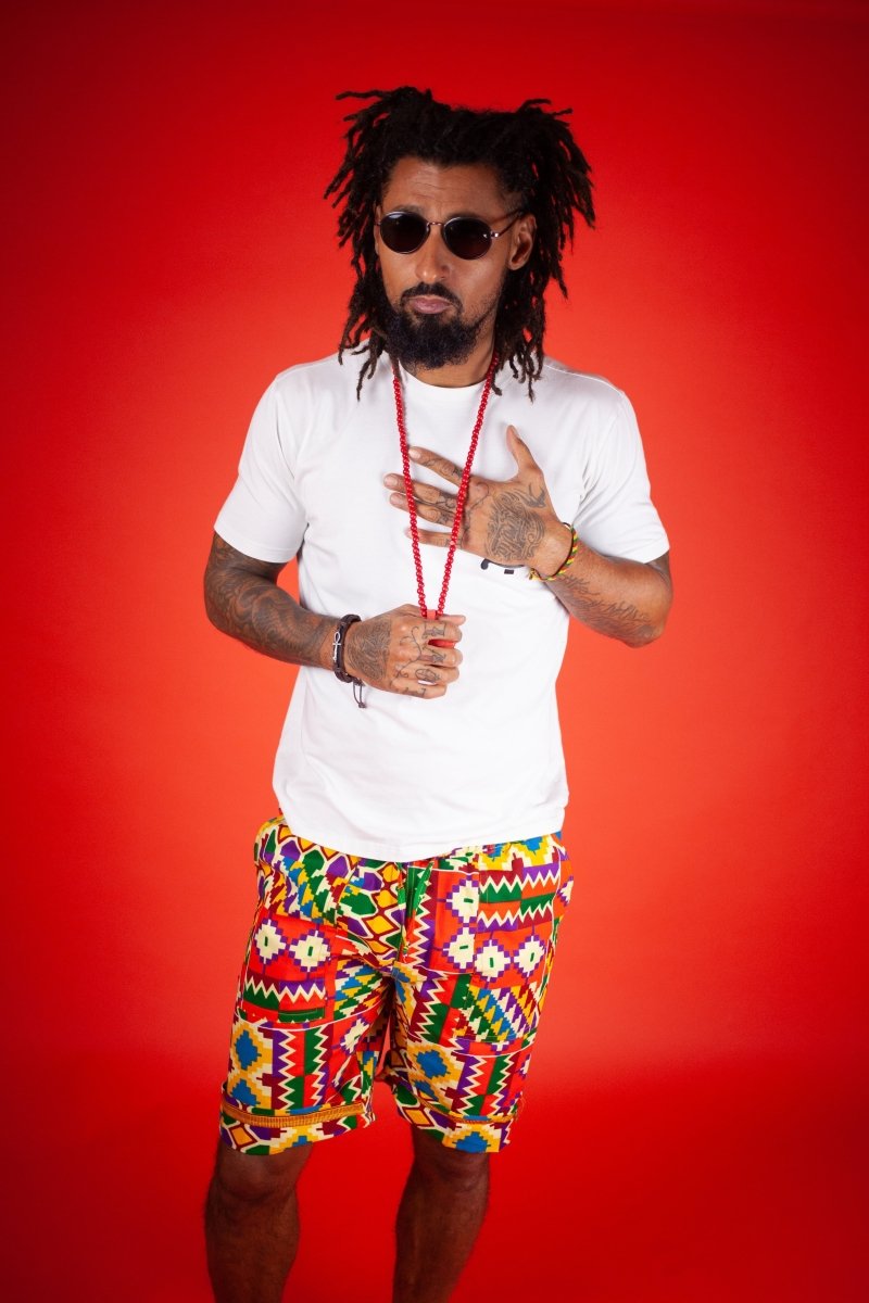 African Shorts in Electric Orange Kente - Continent Clothing