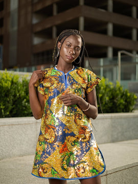 Hermoso vestido estampado africano en dorado metalizado