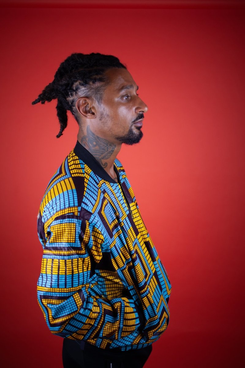 African Bomber Jacket In Electric Blue Kente Print - Continent Clothing 