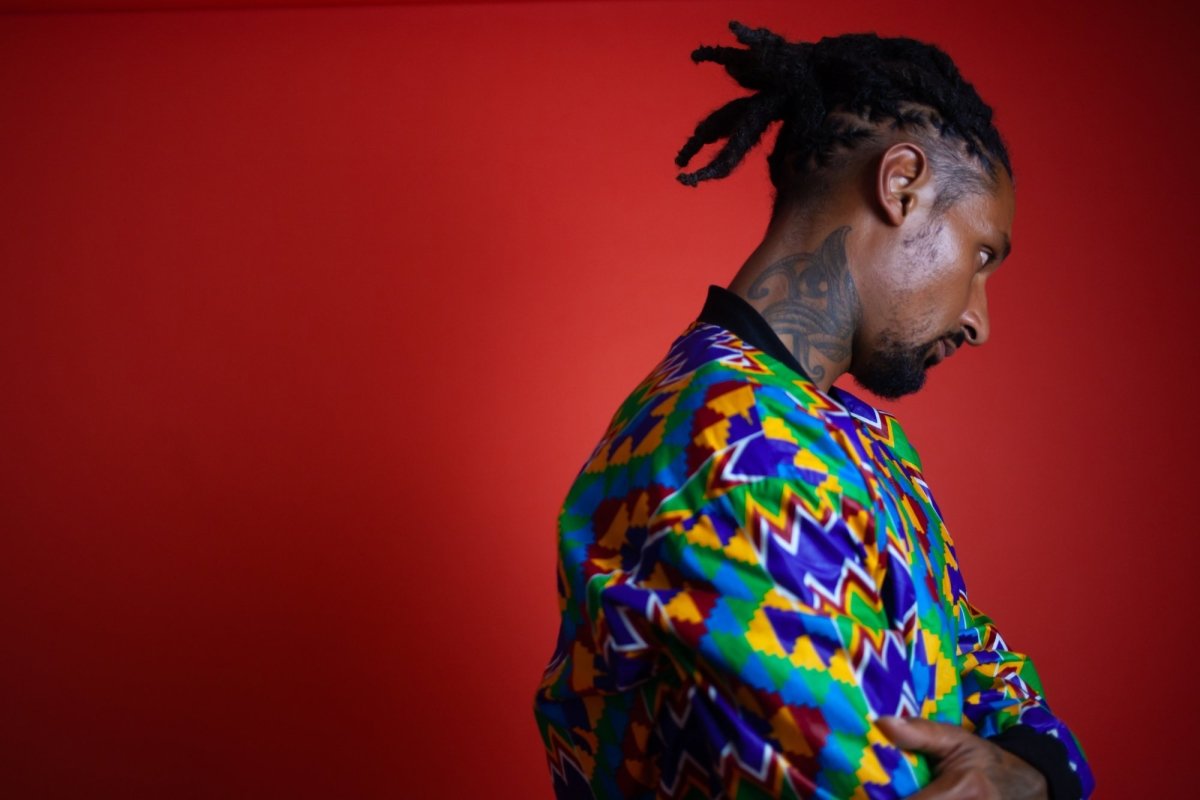 African Bomber Jacket In Electric Blue Kente Print - Continent Clothing 