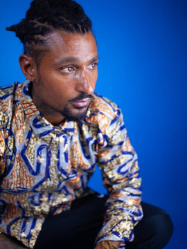 Camisa africana de gran tamaño en naranja dorado